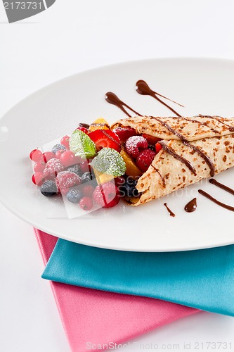 Image of fresh tasty homemade crepe pancake and fruits