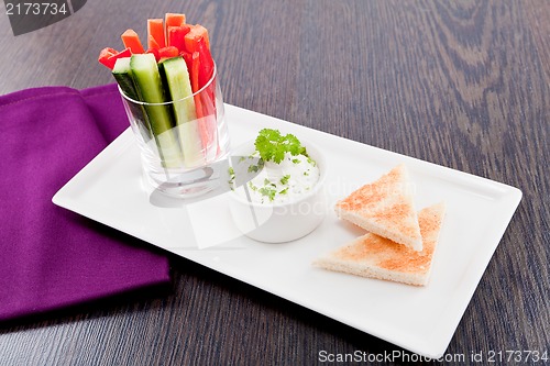 Image of fresh vegetables and cream cheese dip snack