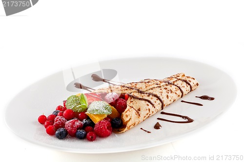 Image of fresh tasty homemade crepe pancake and fruits