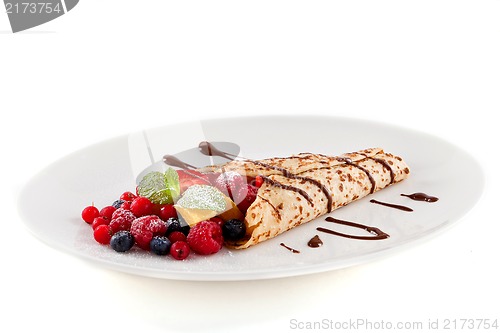 Image of fresh tasty homemade crepe pancake and fruits