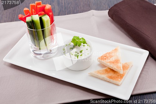 Image of fresh vegetables and cream cheese dip snack