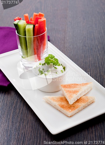 Image of fresh vegetables and cream cheese dip snack