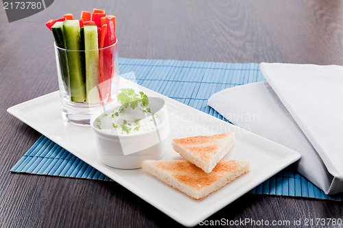 Image of fresh vegetables and cream cheese dip snack