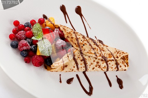 Image of fresh tasty homemade crepe pancake and fruits