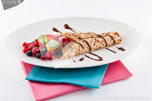 Image of fresh tasty homemade crepe pancake and fruits