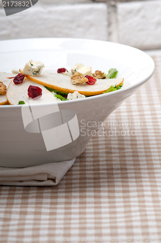 Image of Fresh pears arugula gorgonzola cheese salad
