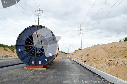 Image of high voltage cable reel roll road construction 