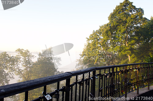 Image of married traditional sign locks forest downhill fog 