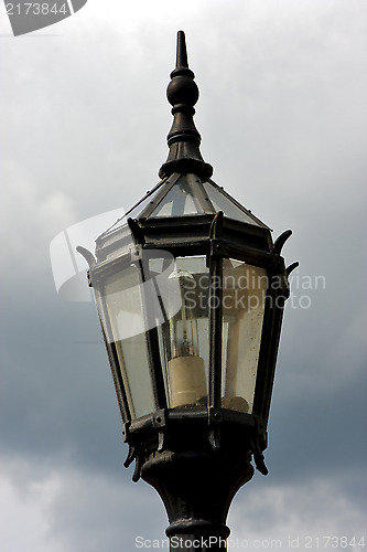 Image of old grey street lamp 