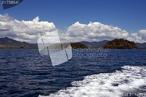 Image of cloudy hill navigable lagoon