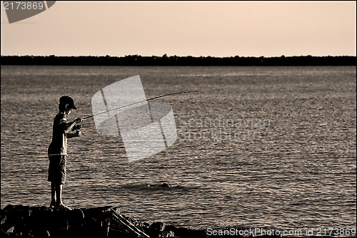 Image of little child fishing 