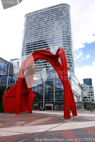 Image of PARIS - May 8: Red arch in business district of Defense to the w