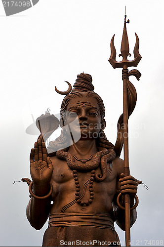 Image of   wood gold statue of a Hinduism    Shiva 