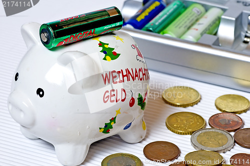 Image of Piggy bank with accu