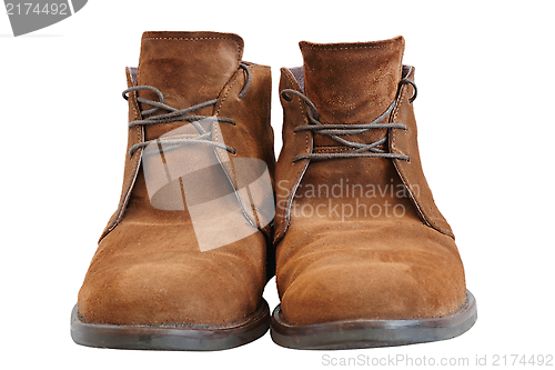 Image of leather boots over white