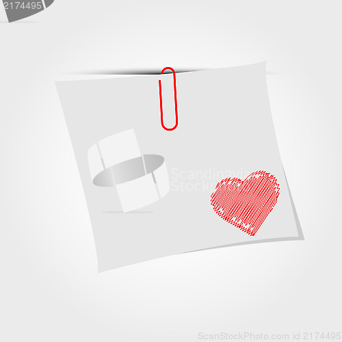 Image of White paper note with clip and red heart