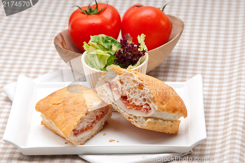 Image of ciabatta panini sandwich with parma ham and tomato