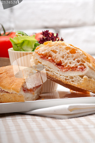 Image of ciabatta panini sandwich with parma ham and tomato