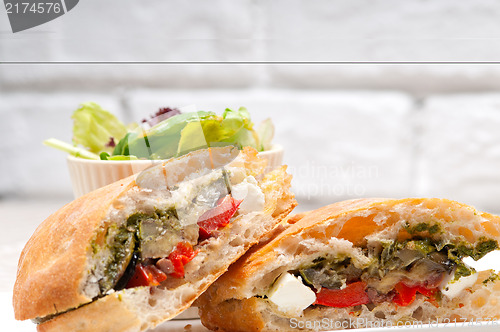 Image of ciabatta panini sandwichwith vegetable and feta