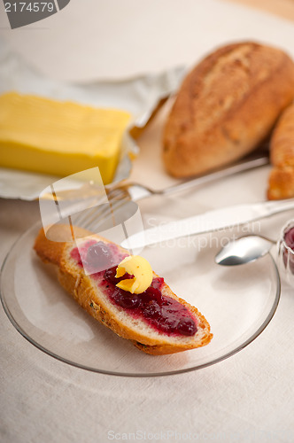 Image of bread butter and jam 