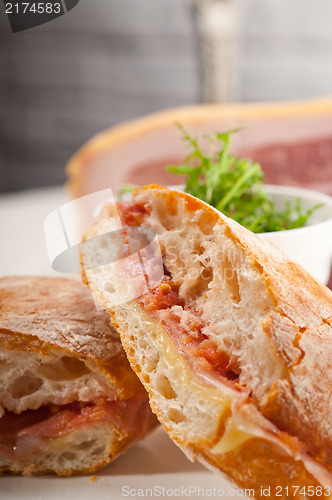 Image of ciabatta panini sandwich with parma ham and tomato