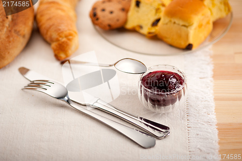 Image of bread butter and jam 