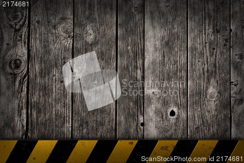 Image of wooden background with warning bar