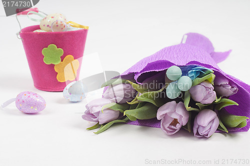 Image of Easter eggs with bucket and tulips