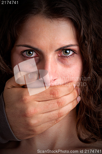 Image of Woman Silenced by Aggressive Husband