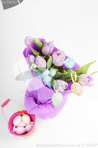 Image of Easter eggs with bucket and tulips