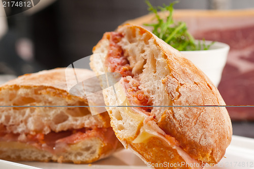 Image of ciabatta panini sandwich with parma ham and tomato