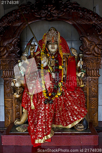 Image of precious stone   wood statue of a Hinduism  women 