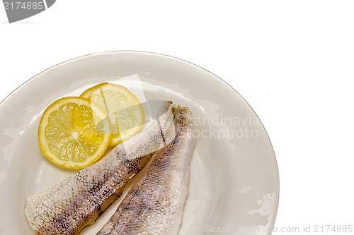 Image of Raw fish filets with lemon