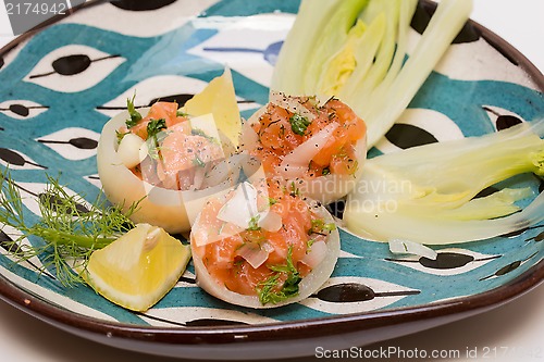 Image of Salmon tartar in onion cups