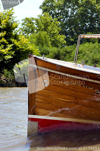 Image of red prow boat 