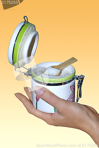 Image of sugar bowl on hand with path