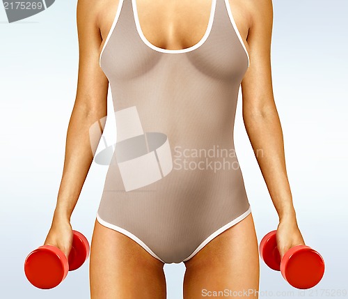 Image of woman with red dumbbells