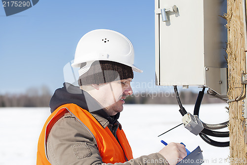 Image of Electrical engineer inspect electric lines  technical quality