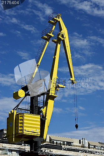 Image of house sky clouds and crane 