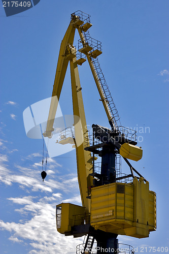 Image of sky clouds and yellow crane  argentina