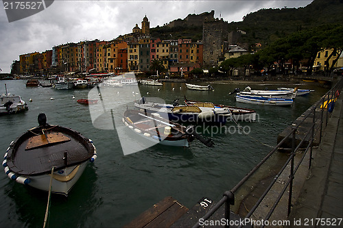 Image of water  boat  house and coastline 