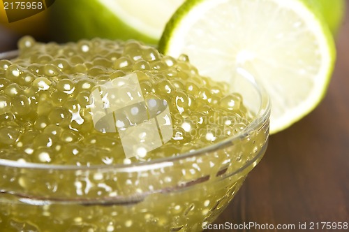 Image of tapioca pearls with lime. white bubble tea ingredients