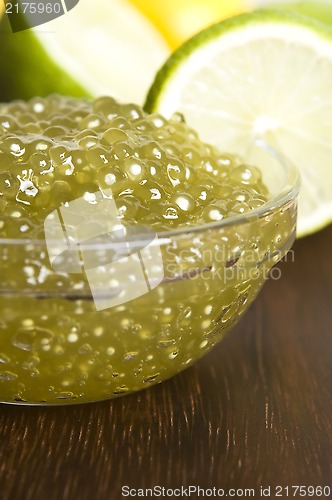 Image of tapioca pearls with lime. white bubble tea ingredients