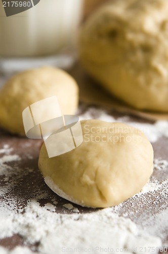 Image of Dough on wooden board