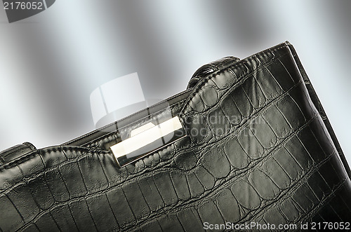 Image of A black business bag isolated on a graduated background