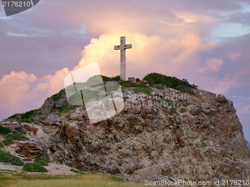 Image of cross on mountain top