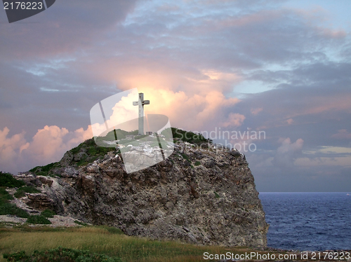 Image of cross on mountain top