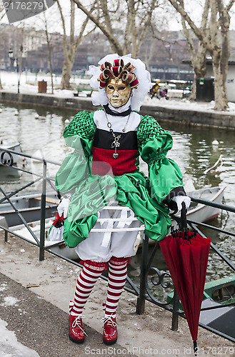 Image of Disguised Person with a Red Umbrella