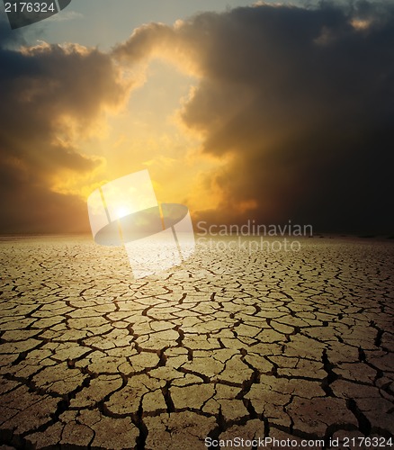 Image of sunset over barren land