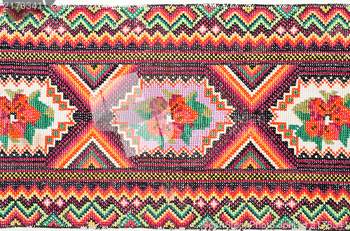 Image of embroidered good by cross-stitch pattern. ukrainian ethnic ornam